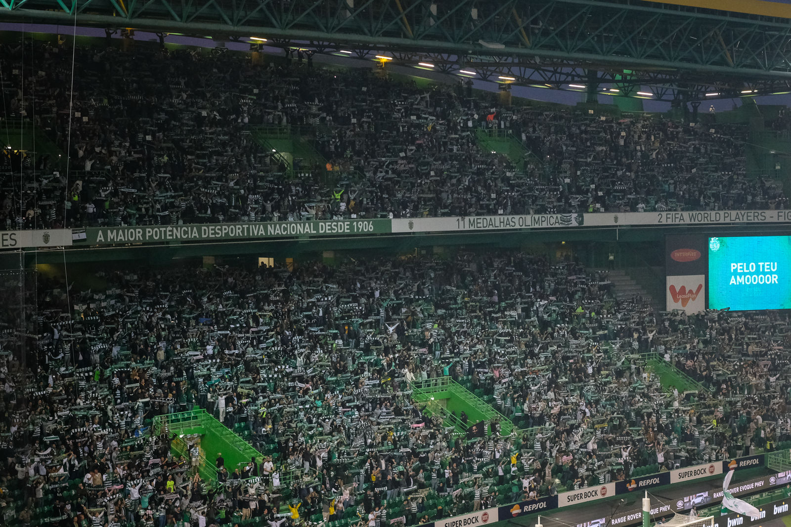 Sporting CP supporters filling the Alvalade stands with green and white scarves raised